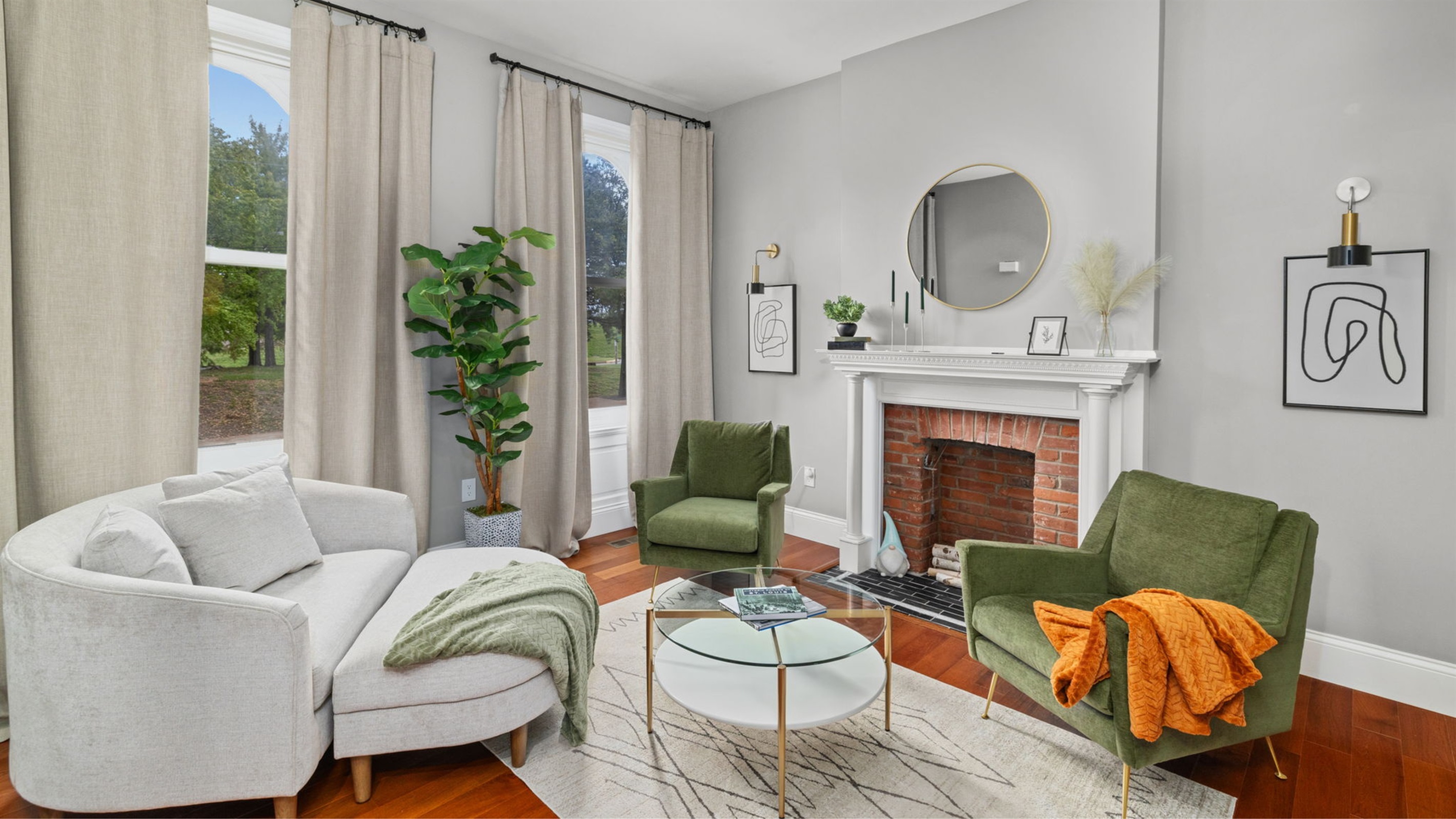 The front living room provides a comfy spot for a nice chat or reading a book.  The fire place is decorative only.