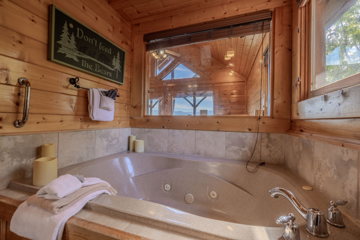 Upper level jetted tub