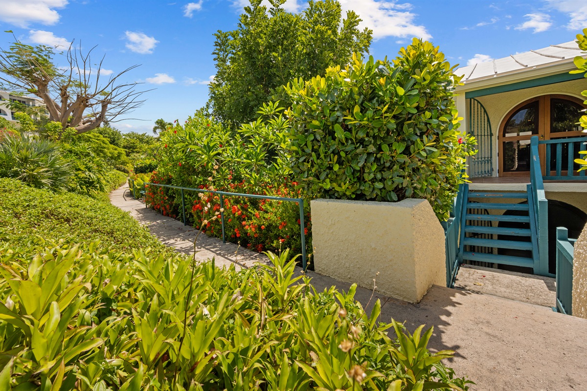 The walkway to the condo, a few steps up and down to reach the front door