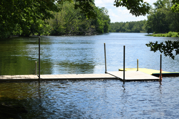 spacious clean swimmable riverfront with shallow entry for littles. Fish from the dock, we've caught plenty here.
