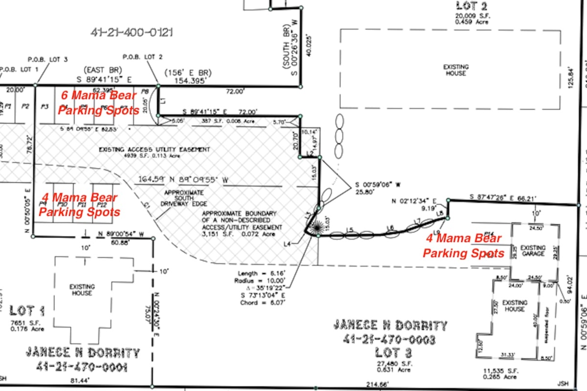 There are 6 Mama Bear parking spots on the north side of the property as you enter the lane to Mama Bear.  Another 4 spots are on the south side and 4 additional spots are next to the cabin down the 250' lane.
