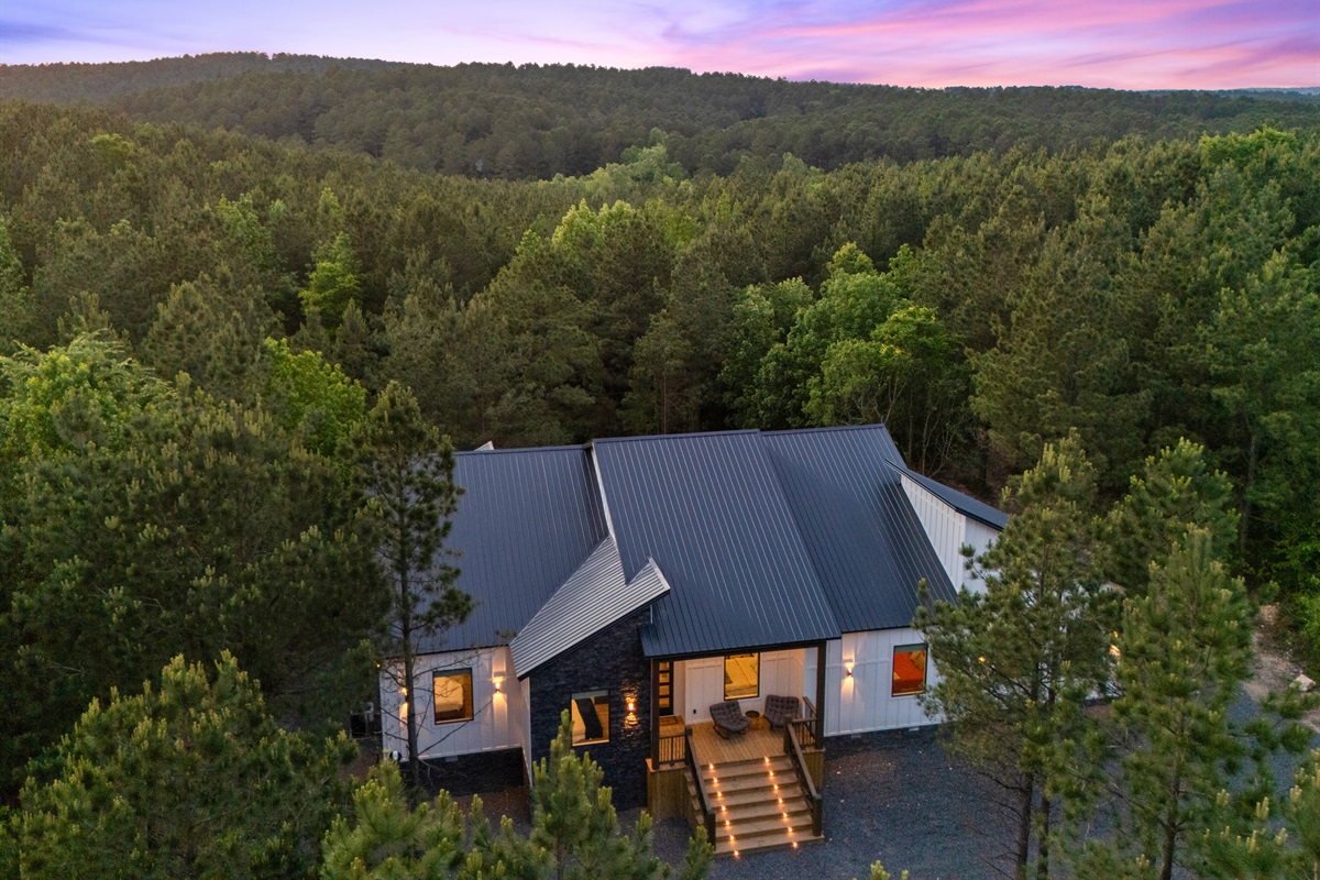 Aerial views showcase just how peaceful and tucked away the property feels within the beautiful natural landscape of Broken Bow.