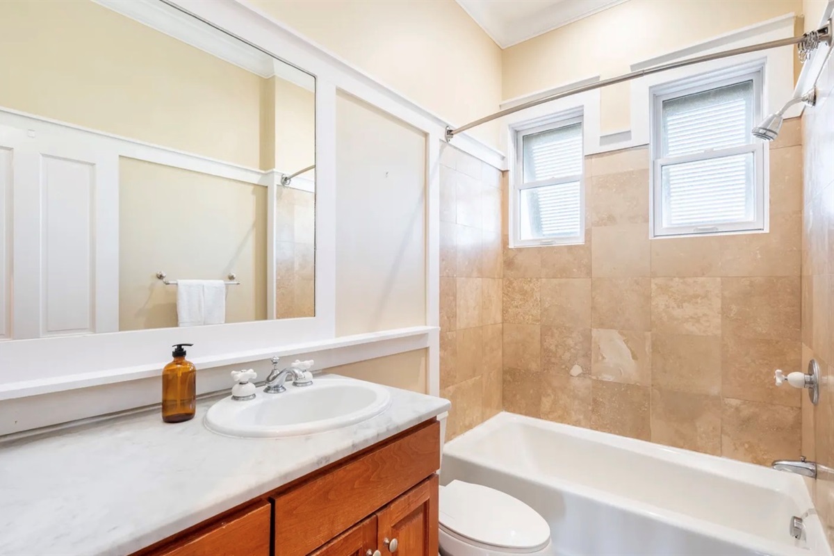 Second Master (1st Floor) with KING bed, ensuite bathroom with shower/tub combo, Gulf Views, balcony access, Smart TV