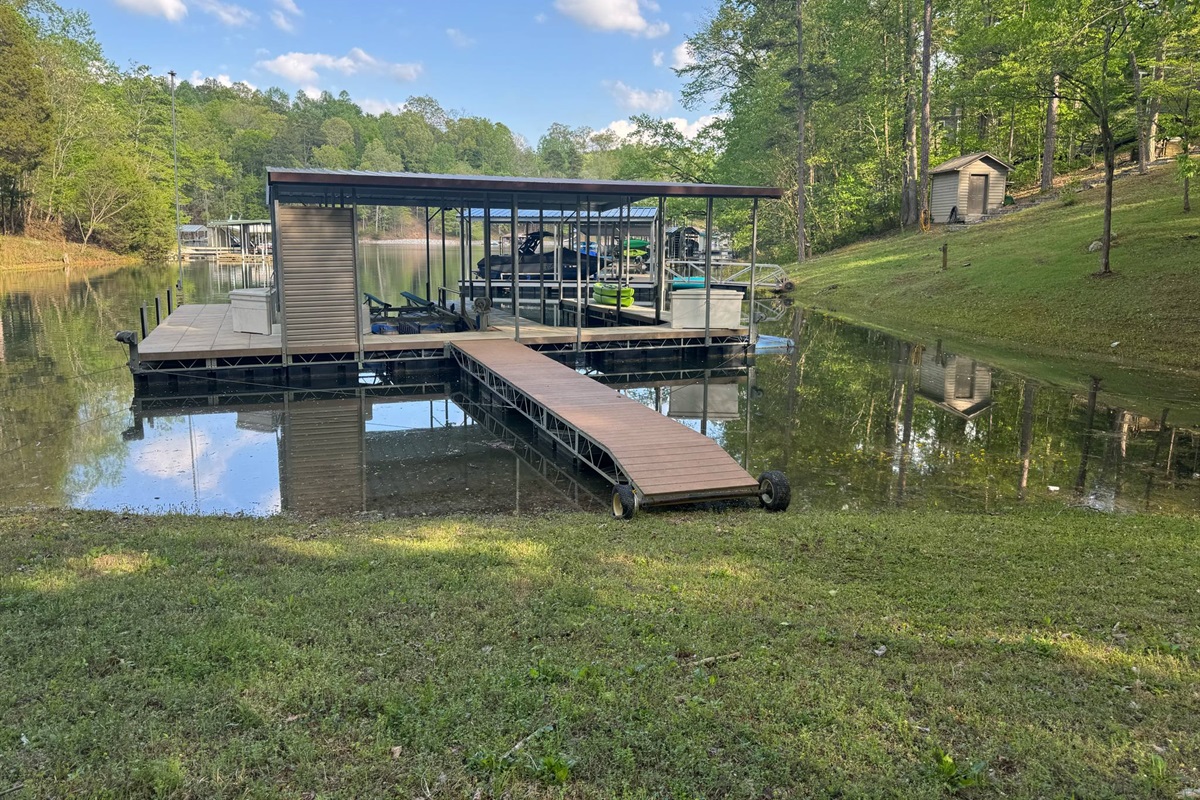Full Pool with dock pulled up to land