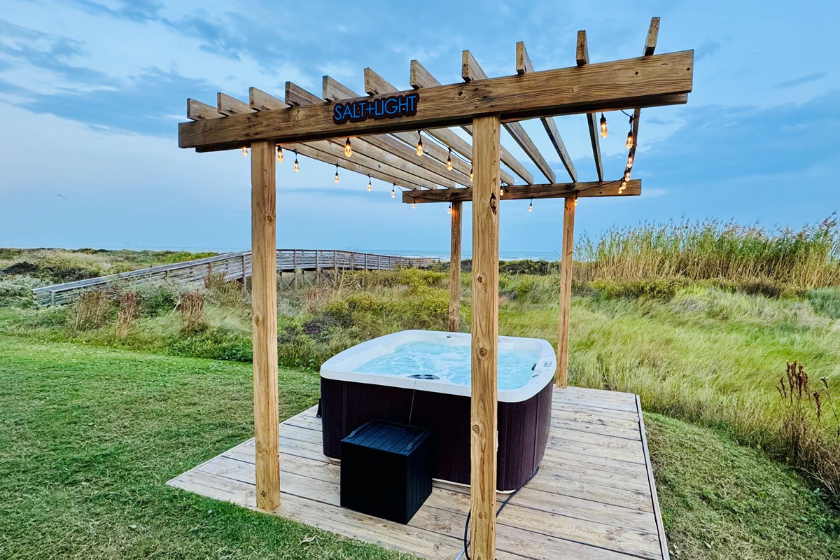 Enjoy your own hot tub after washing off from the beach!