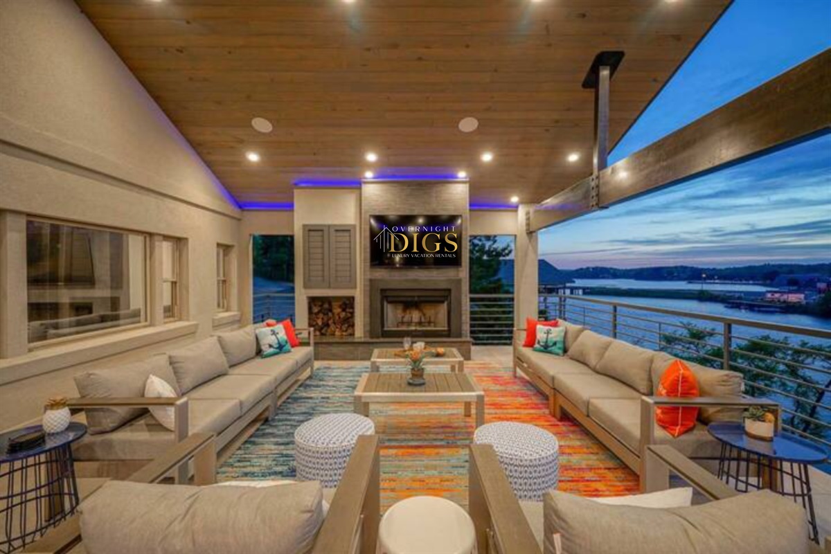 Spend Your Evenings Relaxing on the Large Covered Porch with Smart TV and Large Bar and Grill Area