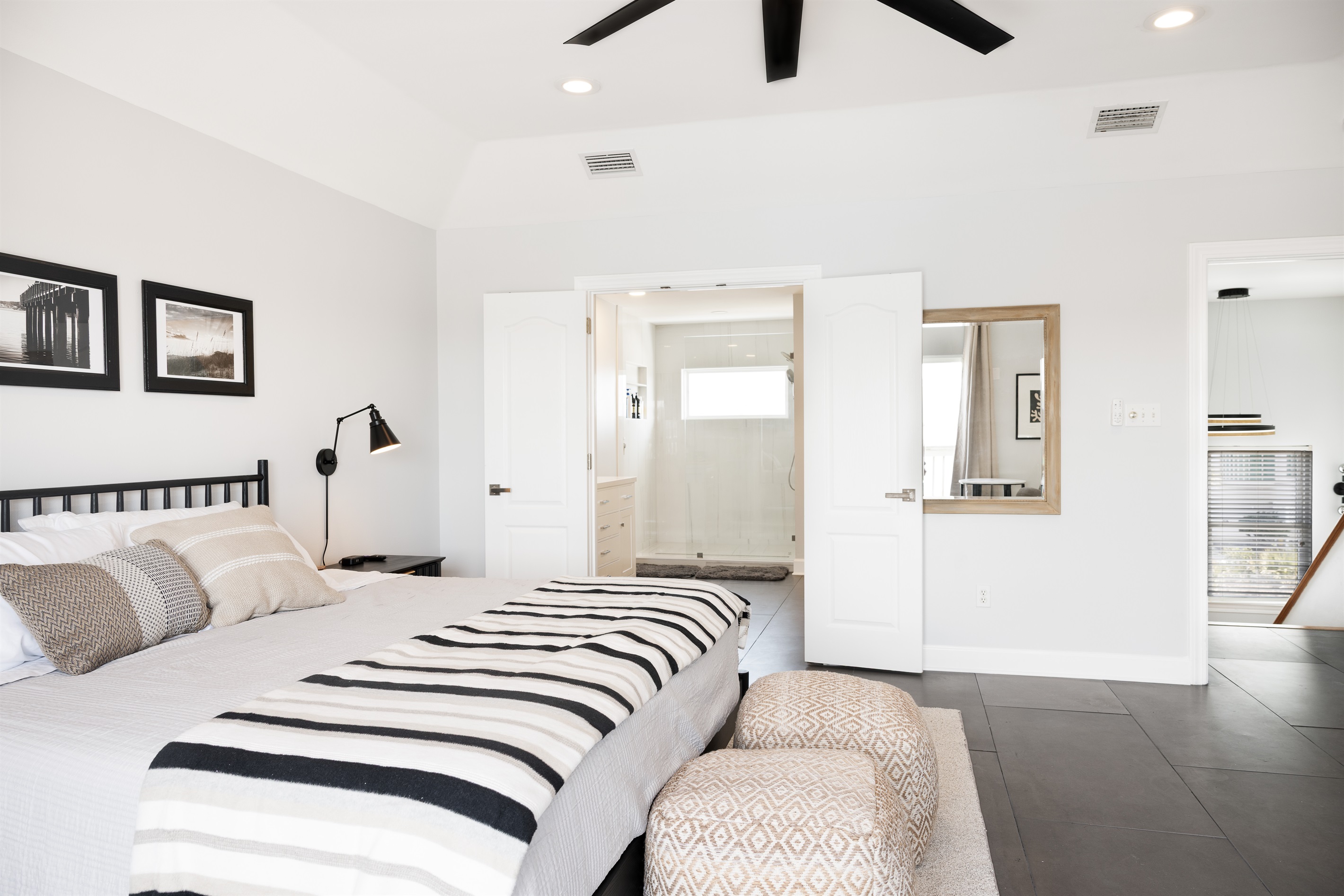 Primary Suite with king bed and private deck with Lagoon and Gulf views