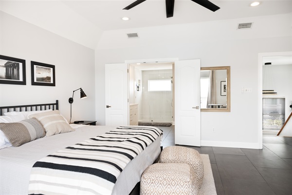 Primary Suite with king bed and private deck with Lagoon and Gulf views