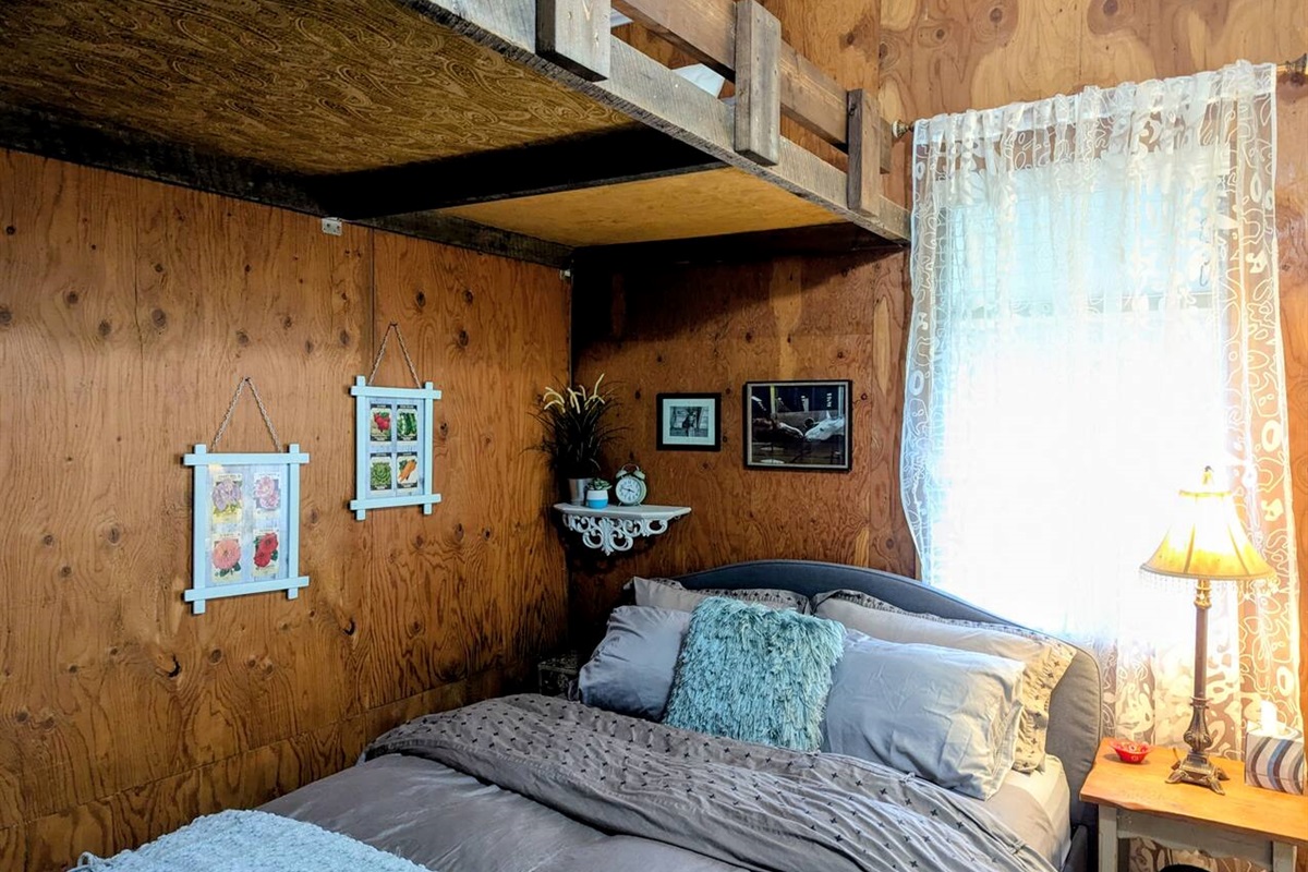 Primary bedroom with twin loft.