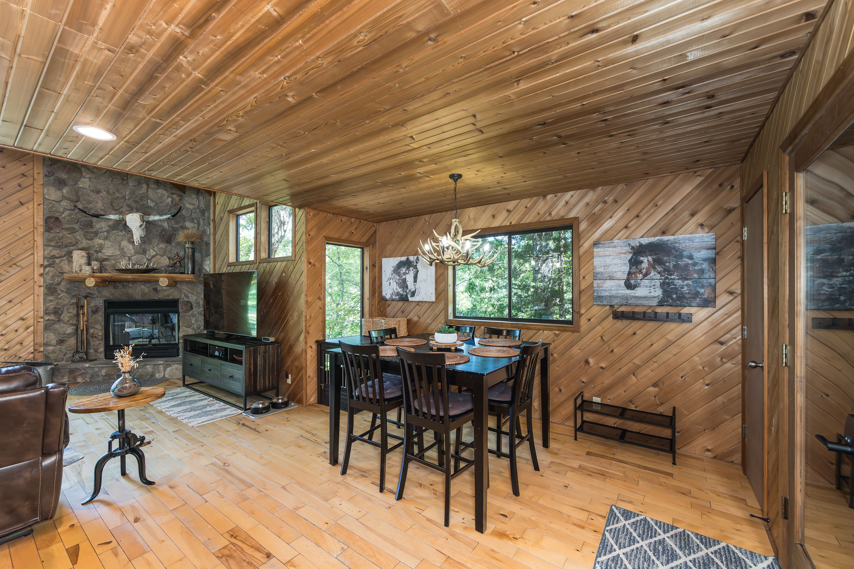 Enjoy meals together with views of the great room and lake.