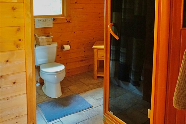 Relax and recharge. This bathroom offers a private sauna for a truly luxurious experience.