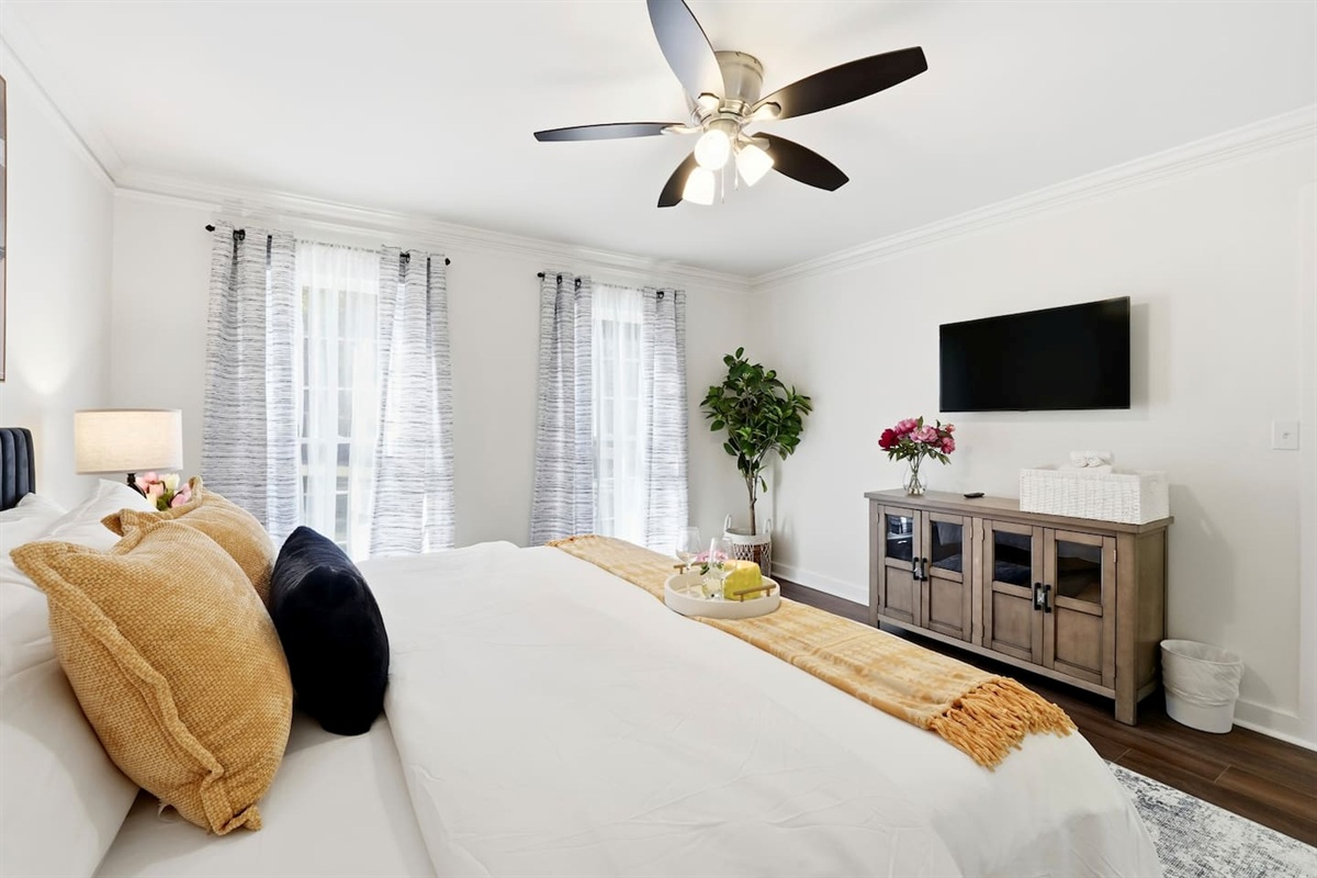Another king bedroom located on the main level (no ensuite bathroom), a Roku-powered Smart TV, and located to the right as you enter the front door. This room includes 2 full-body towels, 2 washcloths, and 2 hand towels for your stay.