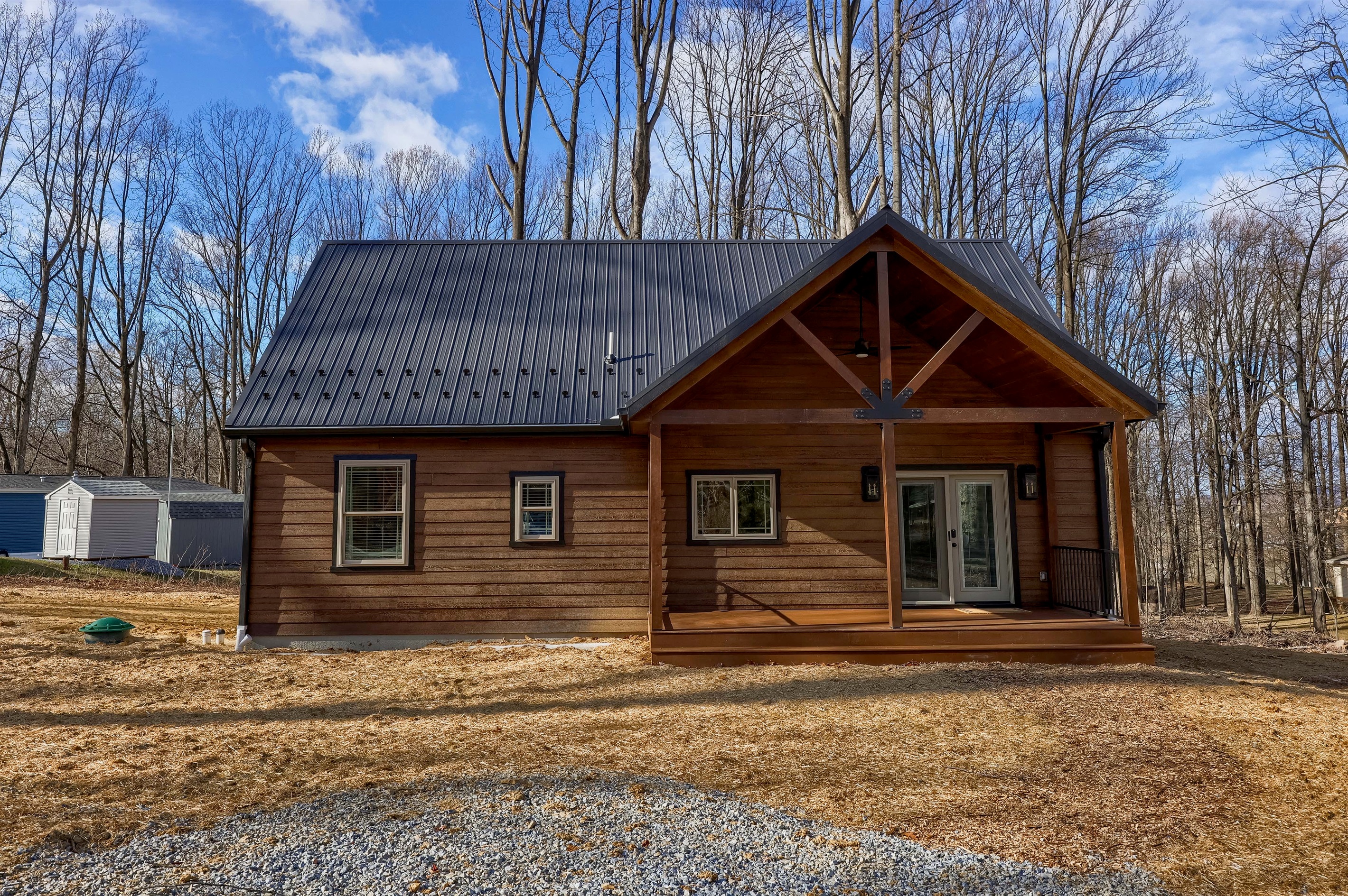 Landscape Coming Spring 2026! Until then, straw is down to help with erosion. Please be patient with us. :)