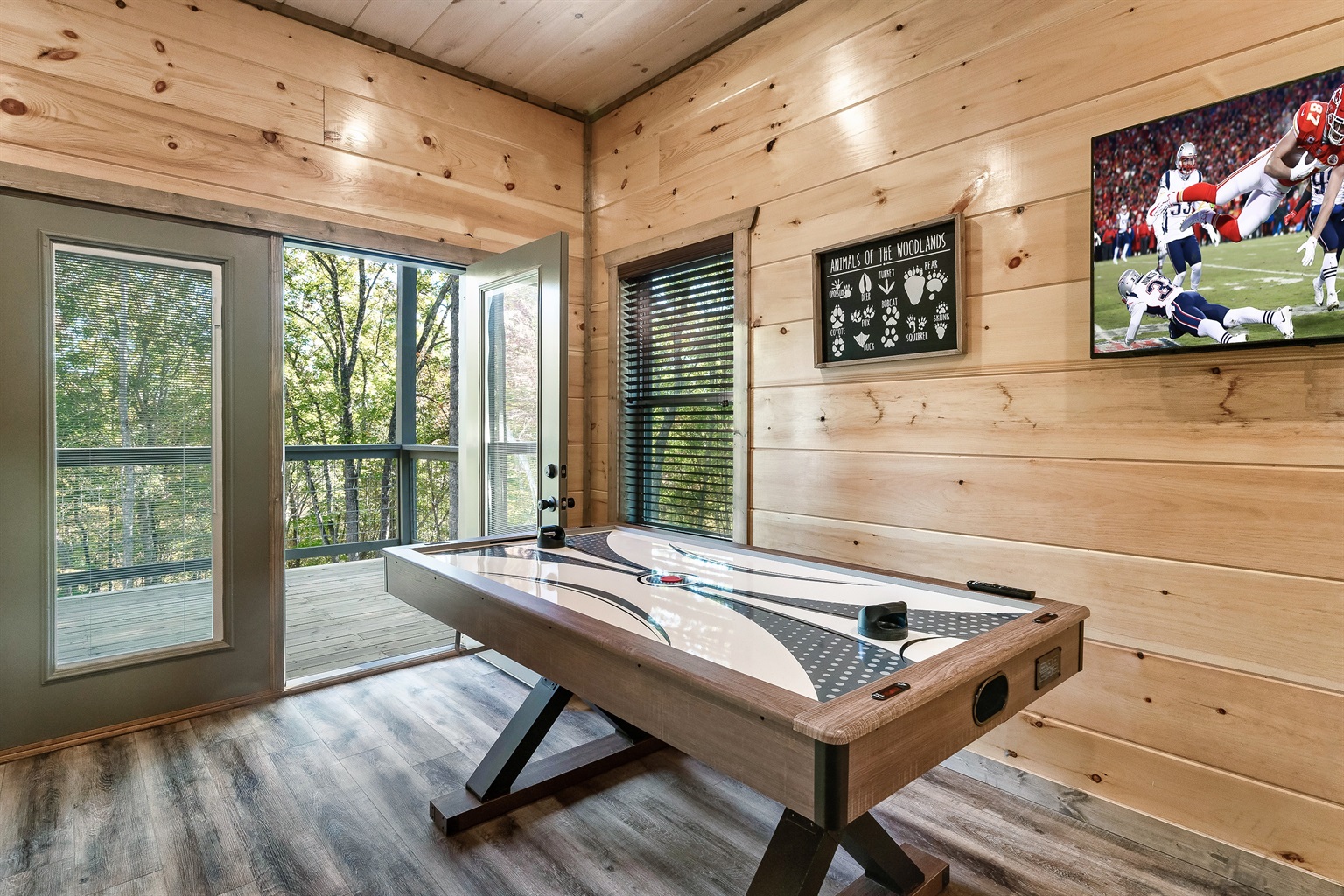 Bring on the friendly competition with a full-size air hockey table.