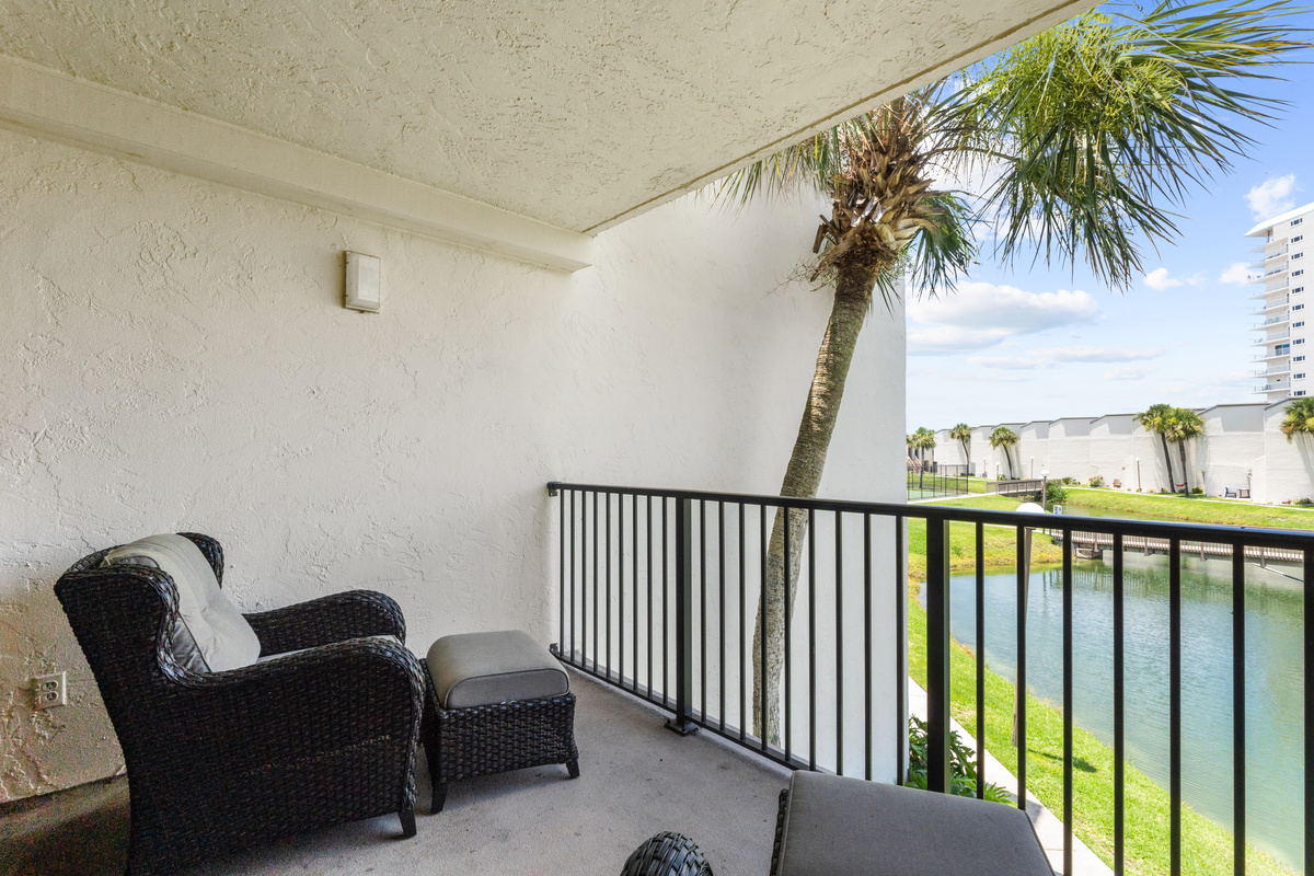 Balcony off Living Room with Outdoor Seating