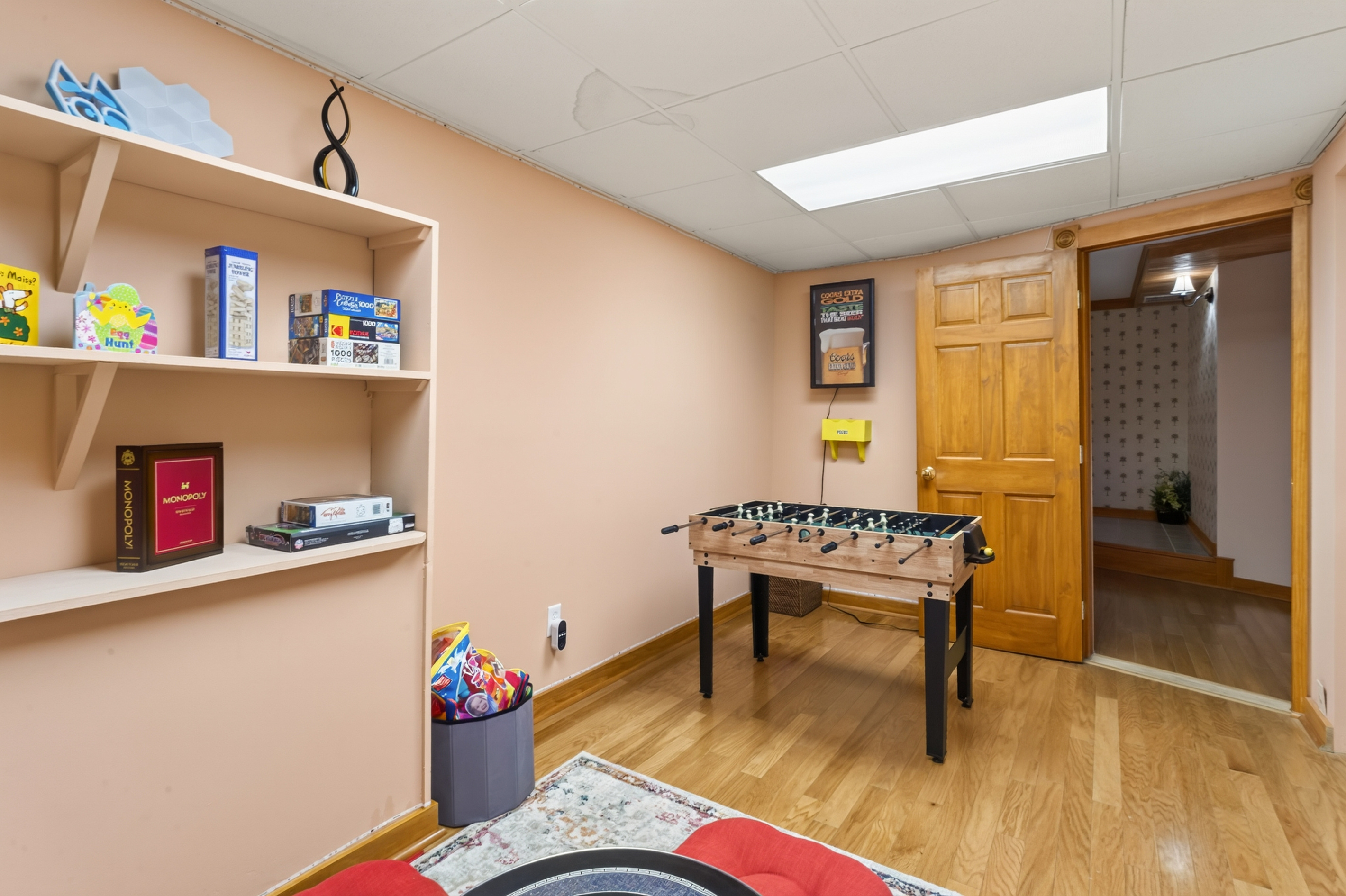Recreation room with table and shelving