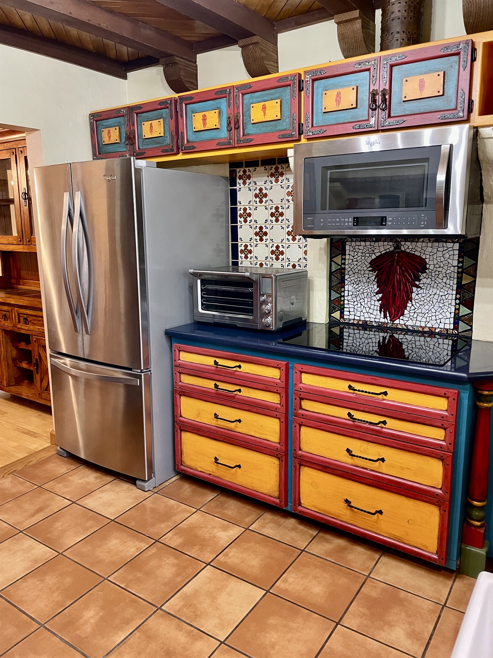 Cooking is a breeze in this fully equipped kitchen, featuring modern appliances and ample counter space.