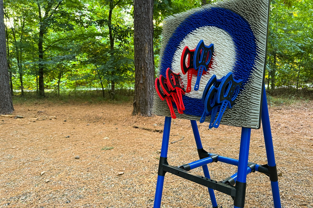 Soft-tip axe throwing for safe outdoor fun.