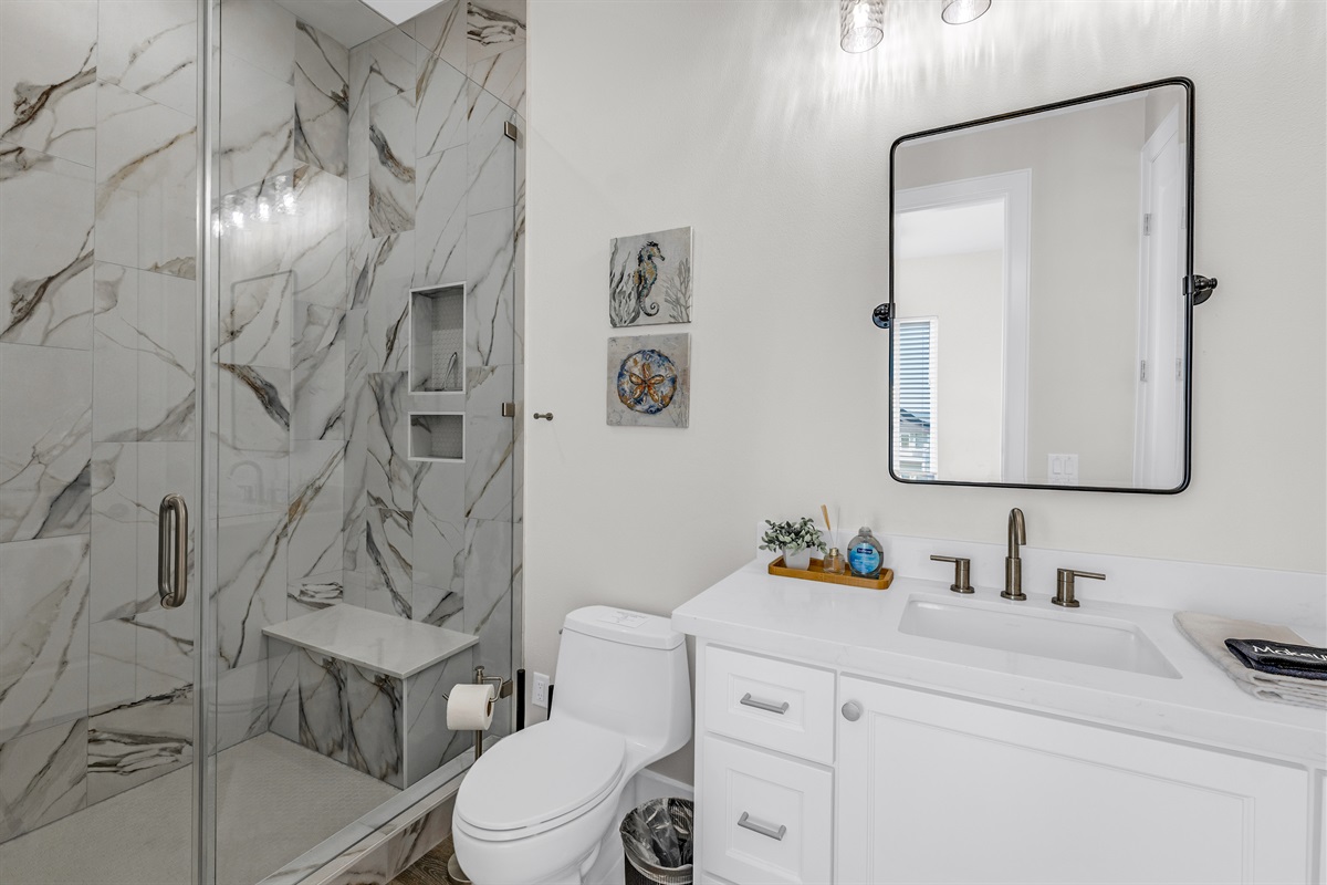 Costa Cristal Bathroom 3 Ensuite: Natural light fills this bathroom, highlighting the sleek shower and creating an airy, welcoming space. Services bedroom 2.