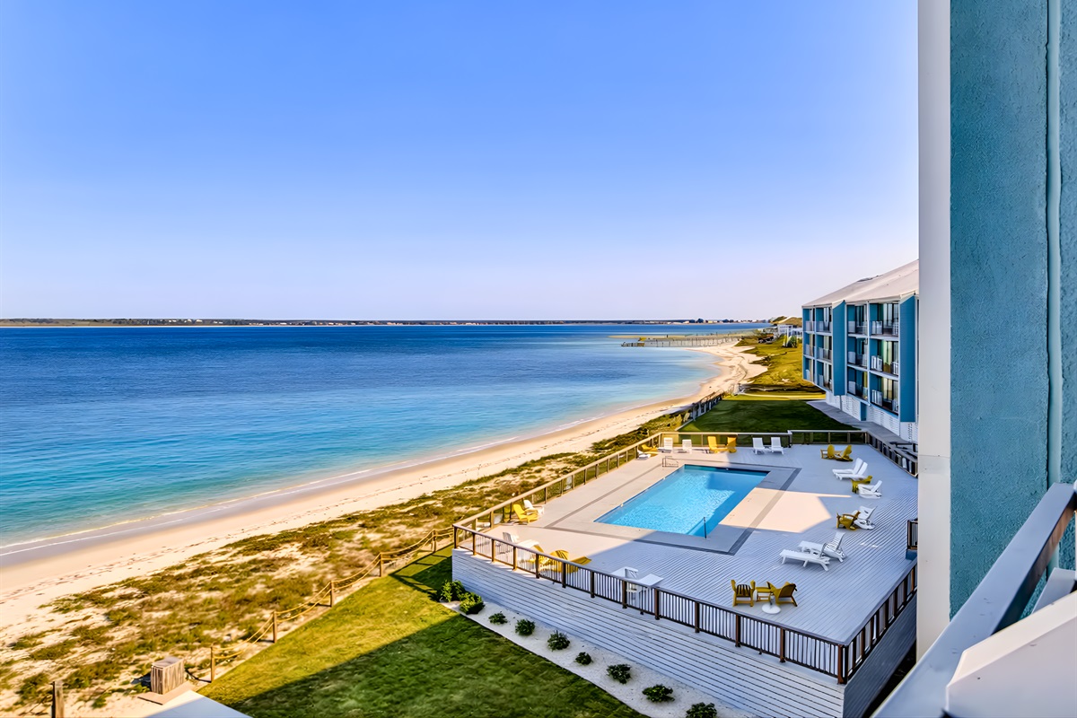 From above, soak in stunning views of the beach, coastline, and sparkling blue water.