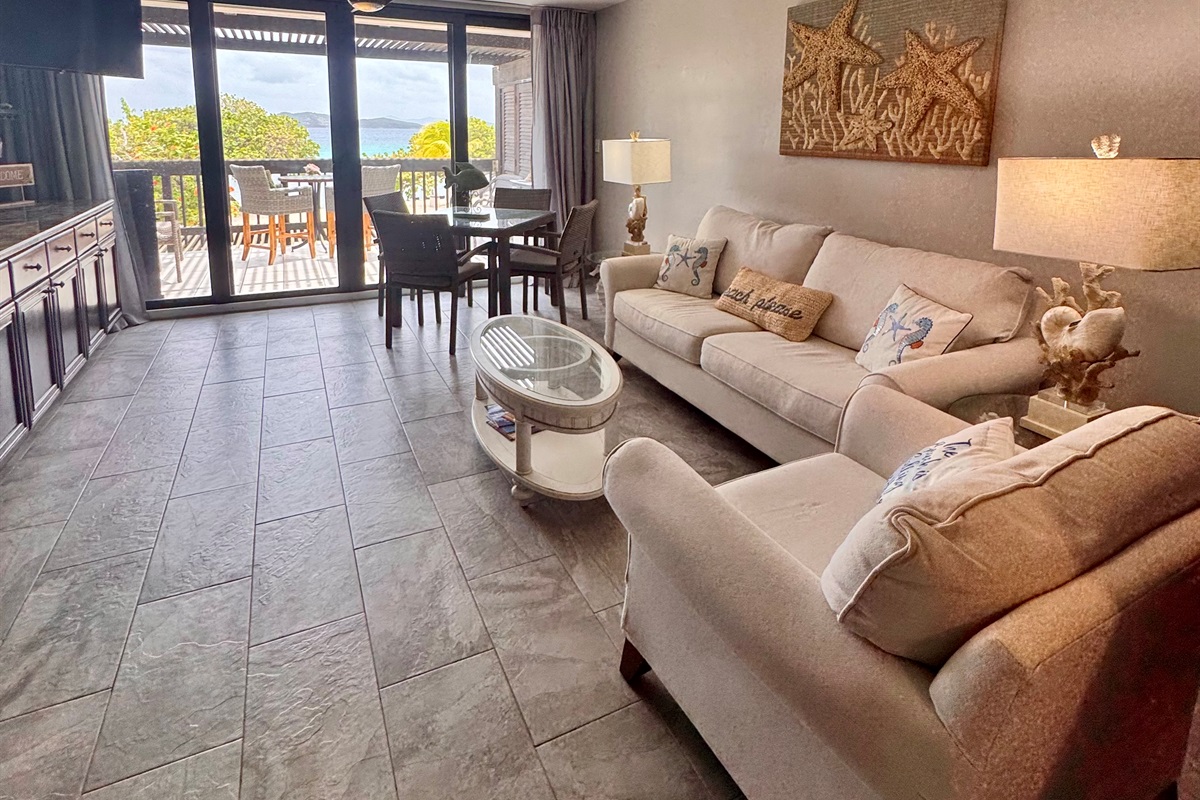 Living room with views of Caribbean off private terrace