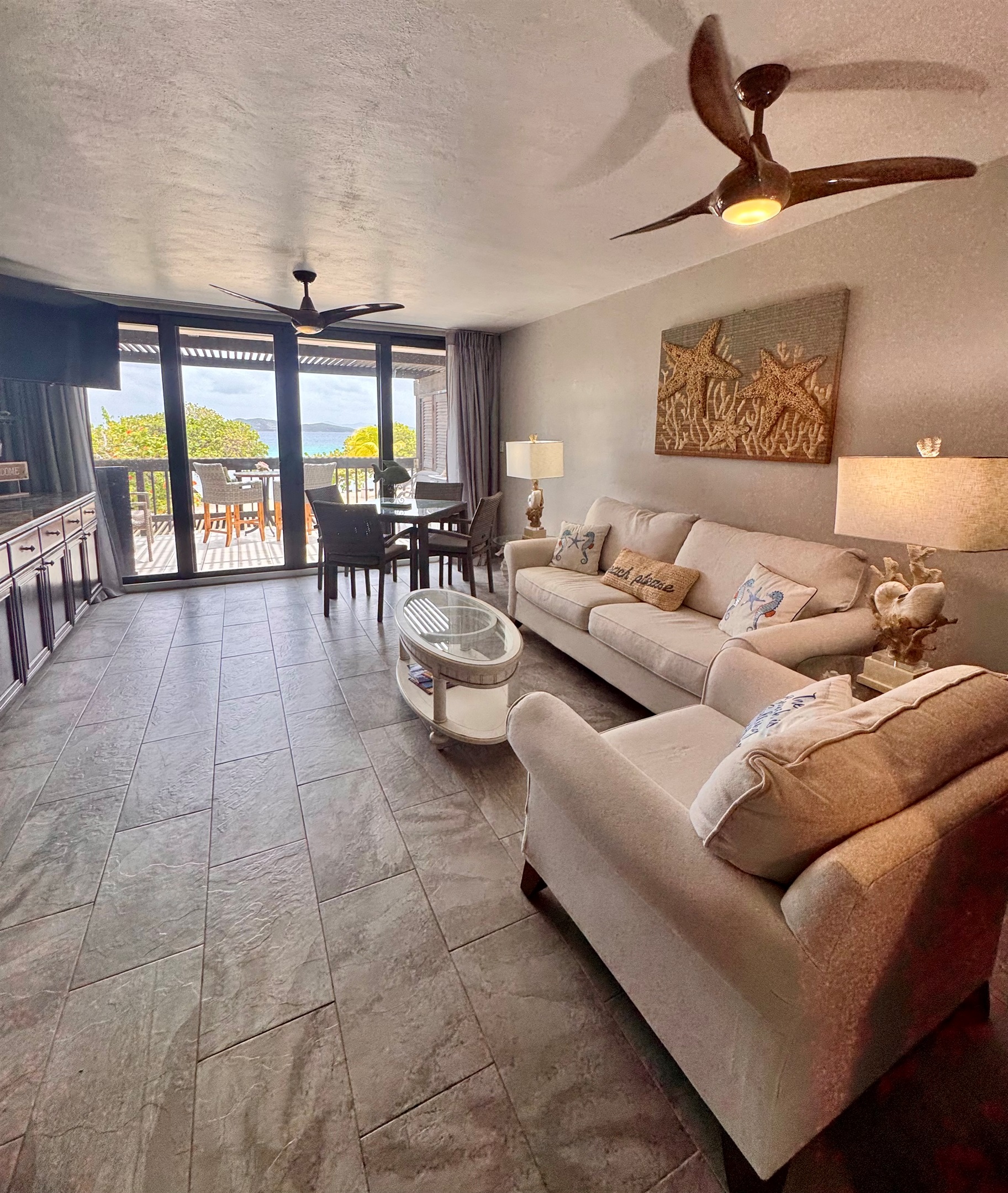 Living room with views of Caribbean off private terrace