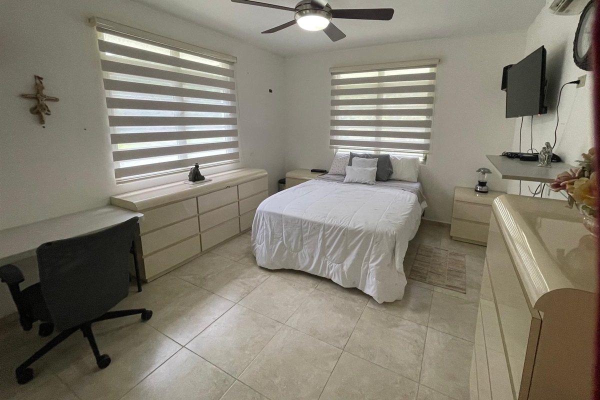second bedroom with queen