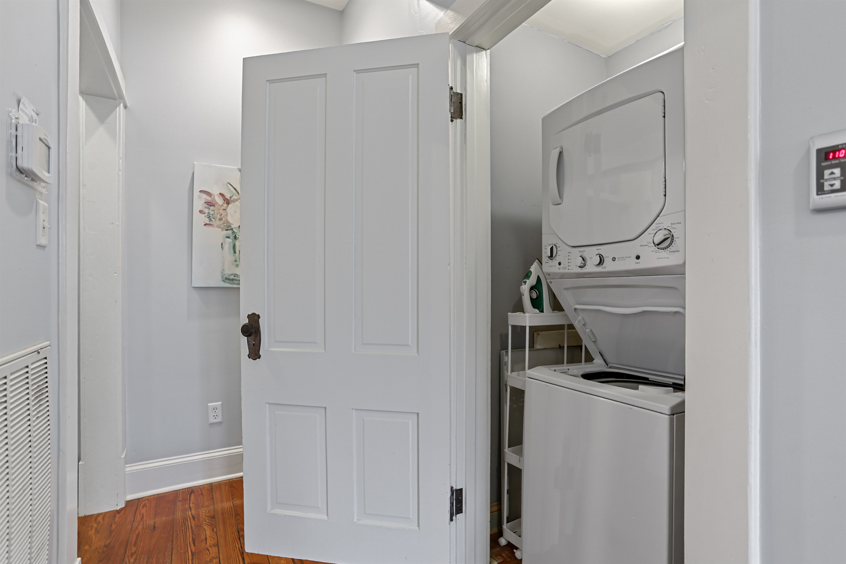 Laundry made easy with a convenient, tucked-away washer and dryer.