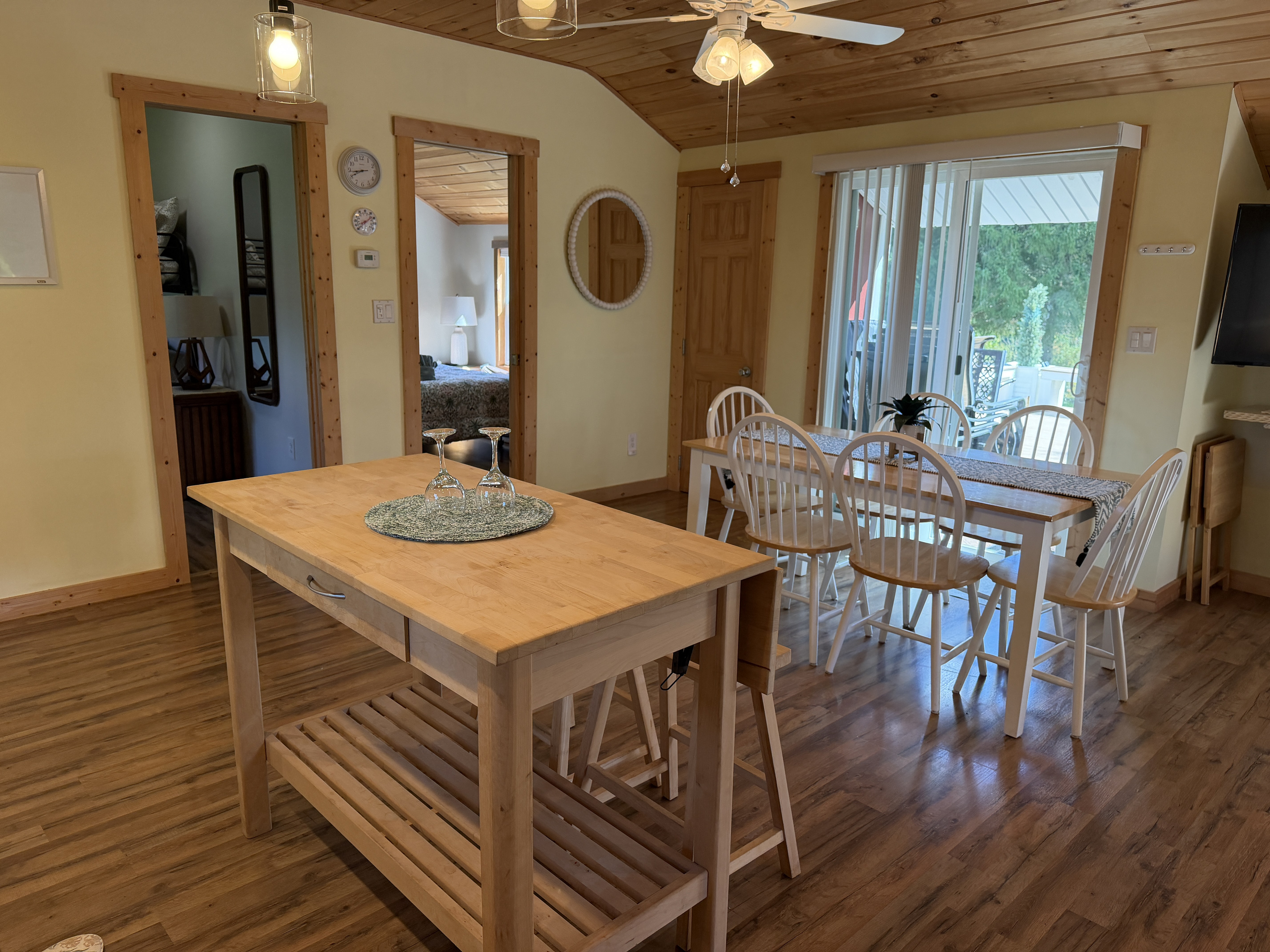 Kitchen, dining areas and sliders to back deck