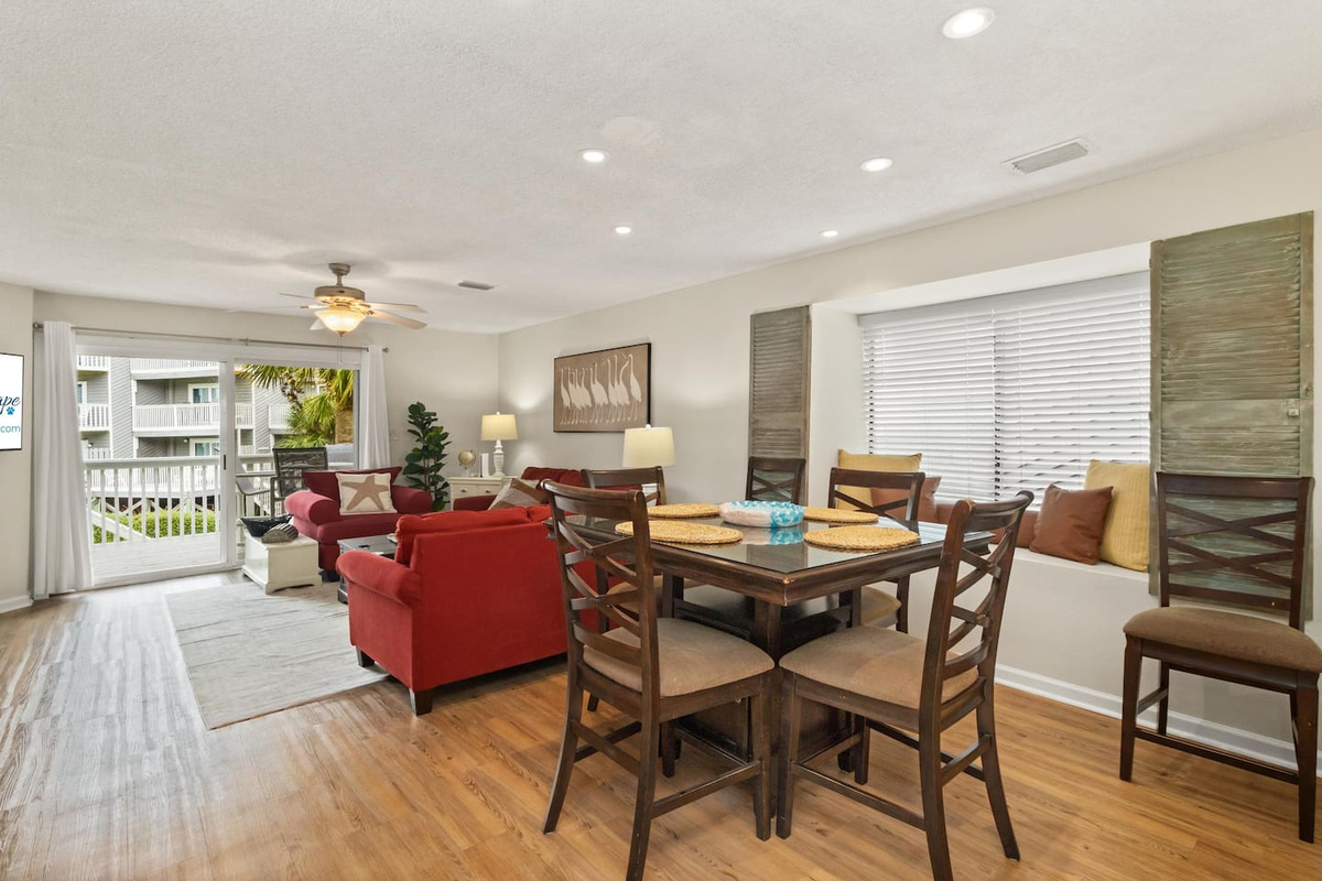 Sit down to breakfast, run a card game after dark, or spread out for a group movie night &mdash; the dining and living area handles it all.