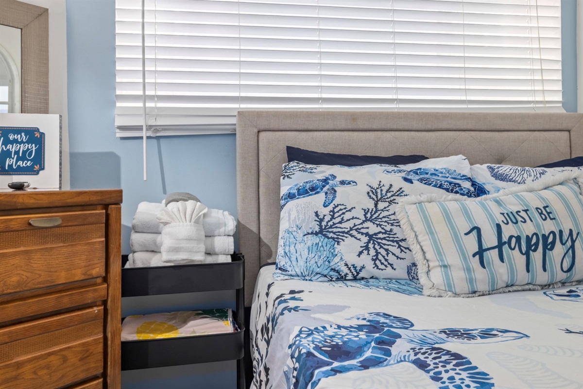 Bedside nightstands with additional towels