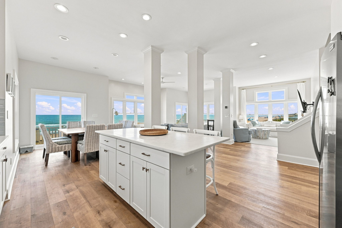 From morning coffee at the island to evening movie nights, this open living space was made for vacation memories.