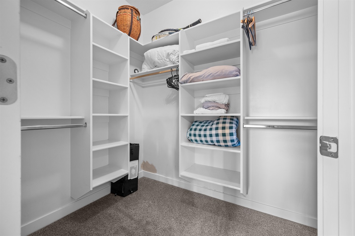 Large walk-in closet with plenty of storage for extended stays.