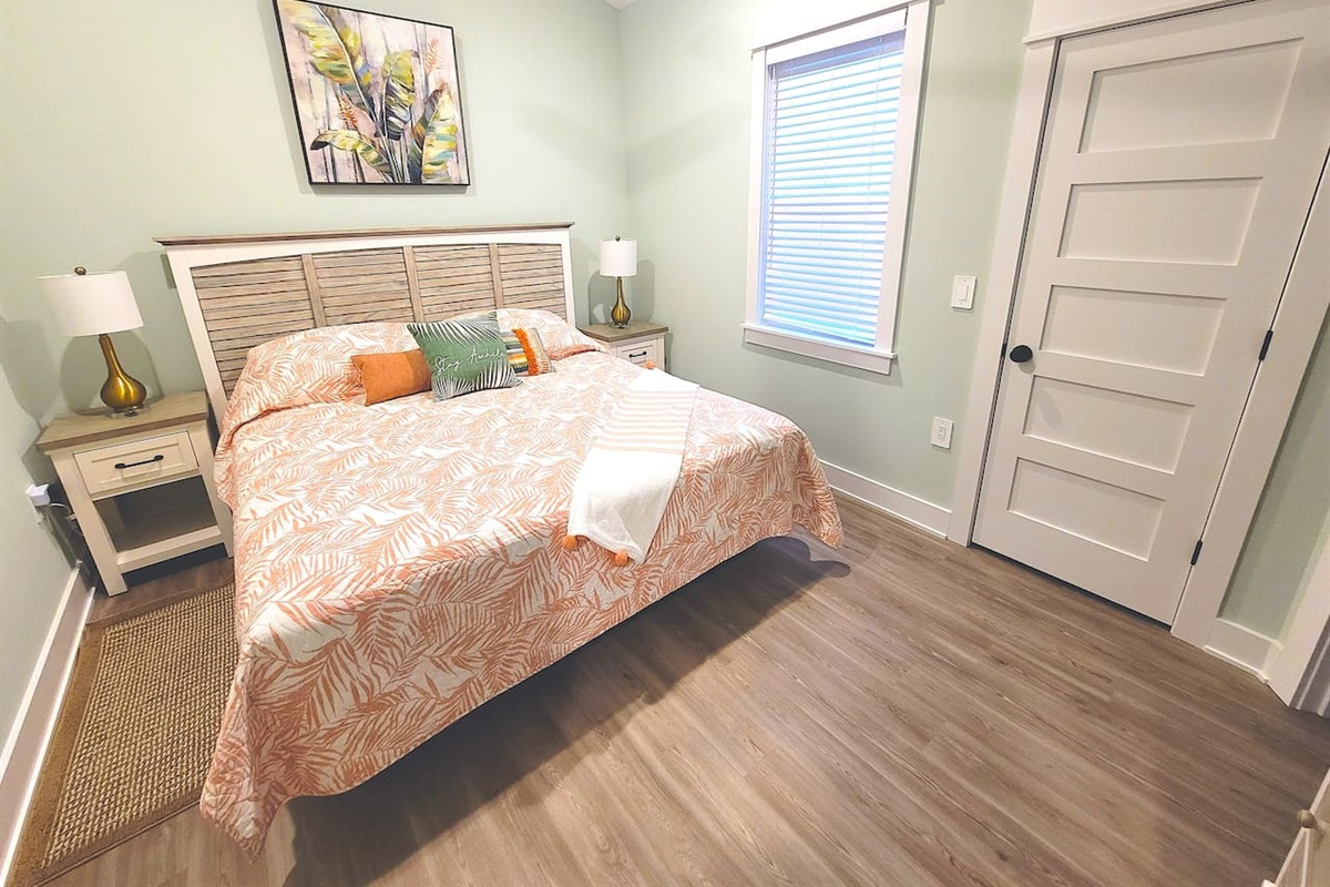 Master bedroom has high cathedral ceilings with lots of natural light. 