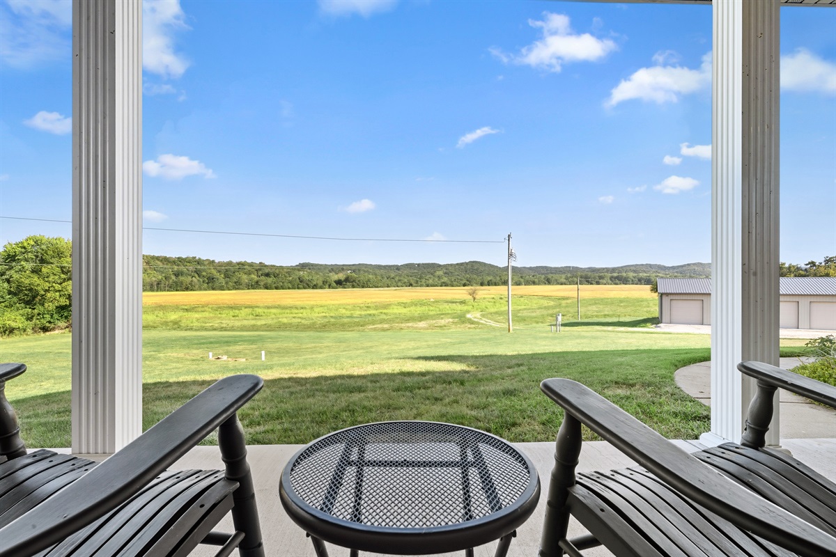 Morning Coffee tastes better here. Rock away your worries with peaceful views from the front porch.