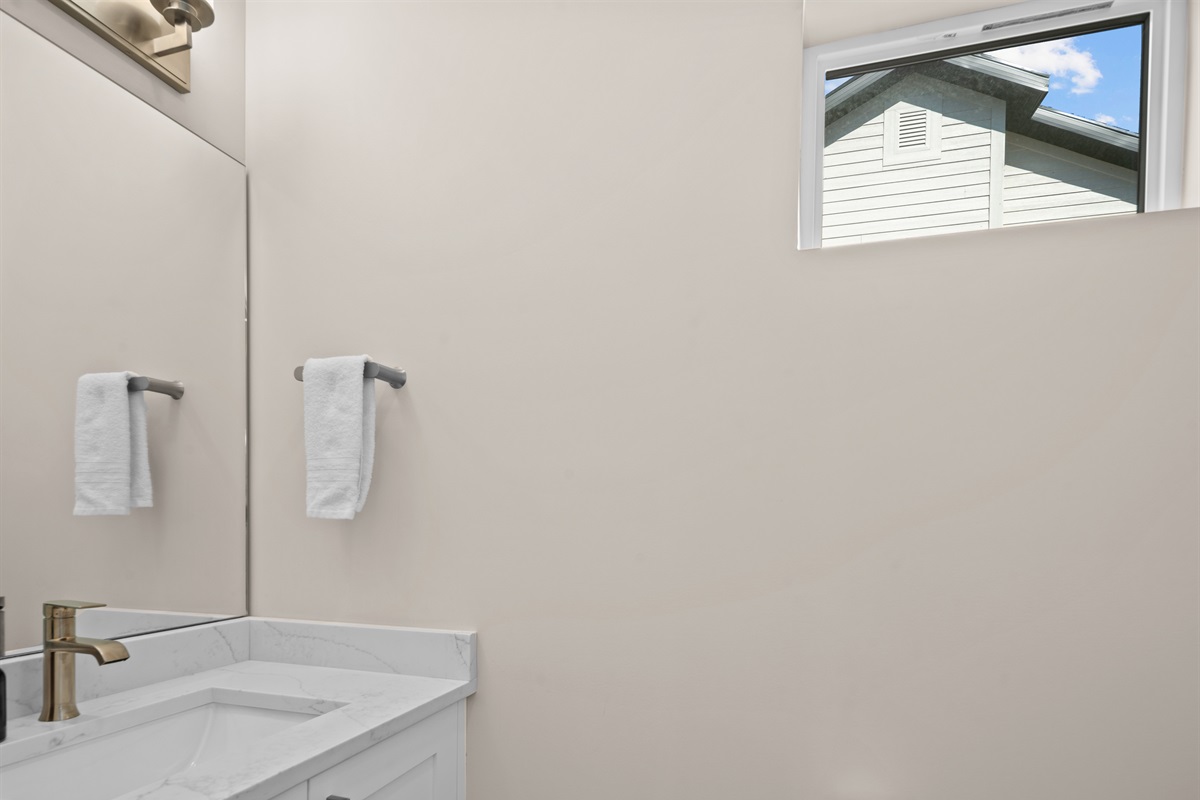 Convenient half bath on the main level.