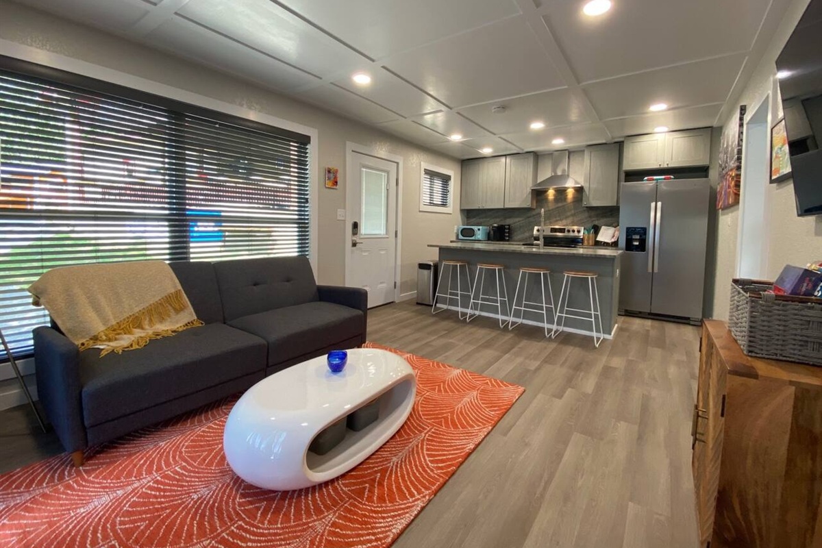 Enjoy Lakefront Views from the Open Living and Kitchen Areas.