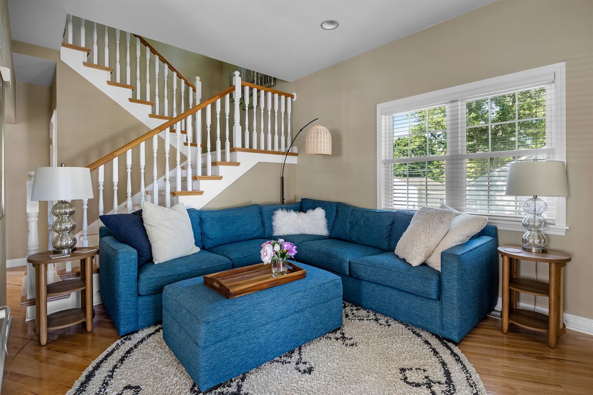 As you enter you are welcomed with a large living area, perfect for watching movies together or curling up with a good book!