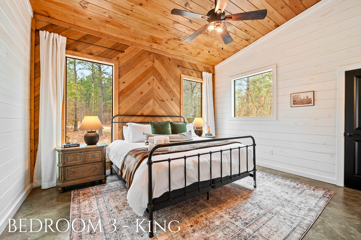 Kick back in this cozy king suite with a forest view that brings the outside in. Perfect for those mornings when you just want to bask in the sunlight and the stillness of nature.