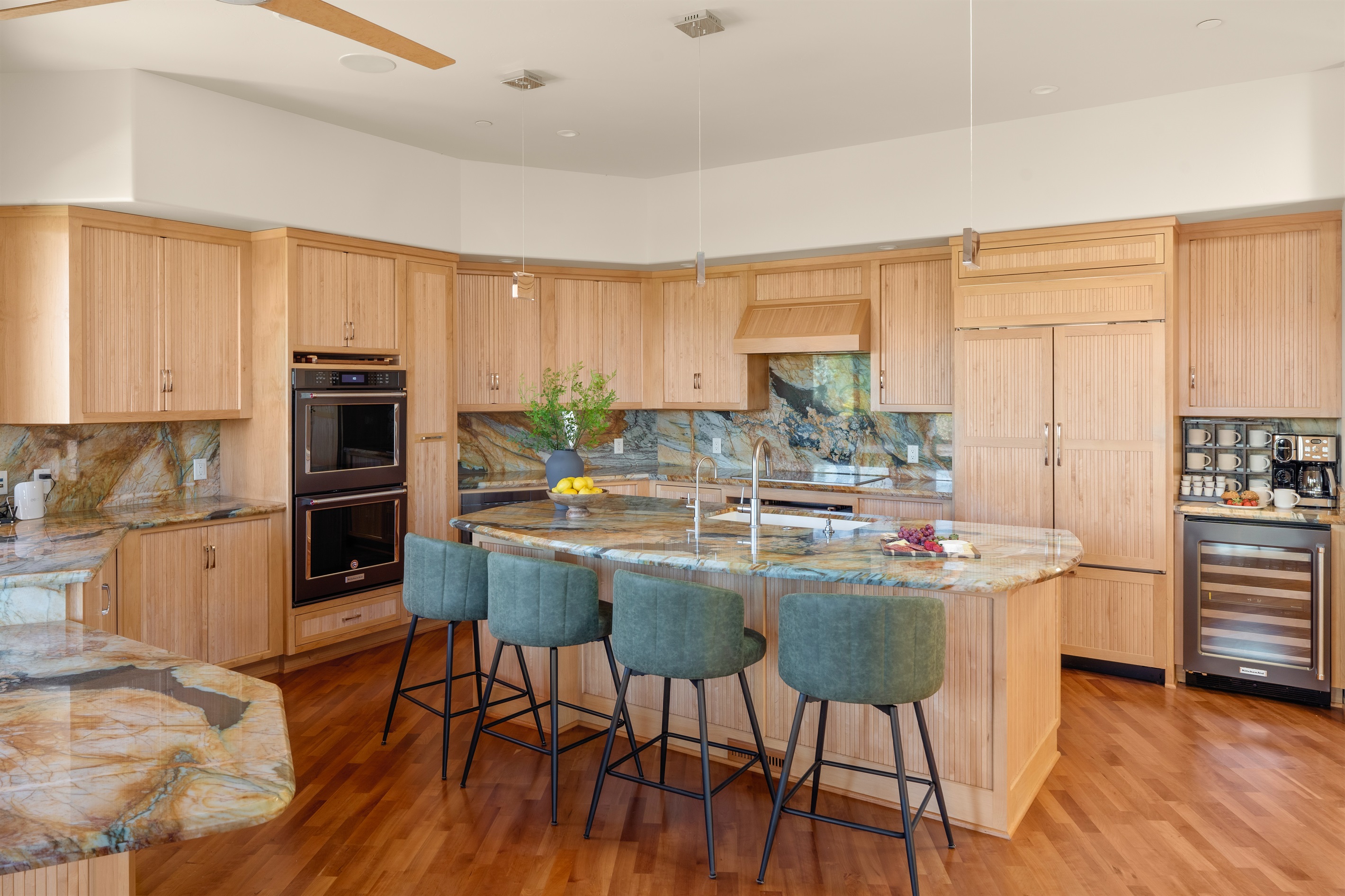 The heart of the home. Our fully equipped chef's kitchen features expansive marble countertops, premium appliances, and massive island seating perfect for entertaining.