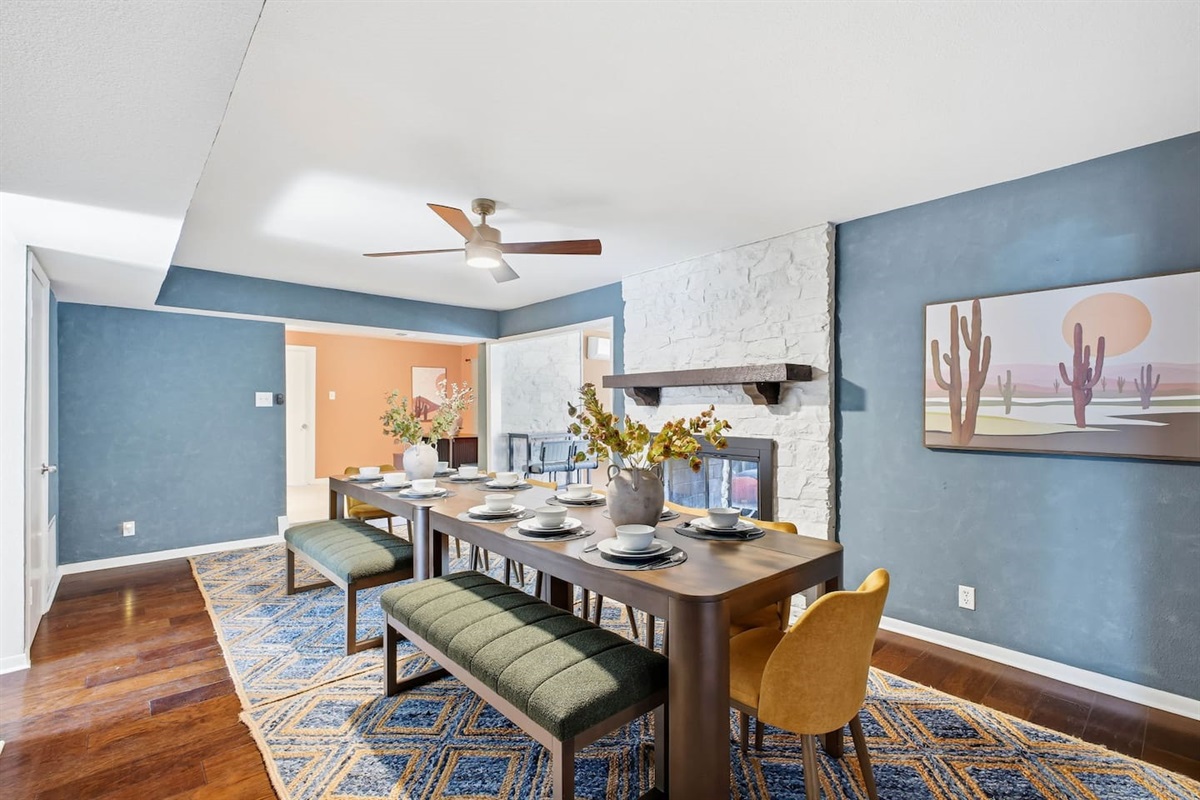Dining table seating 14, with the kitchen and breakfast nook in the background