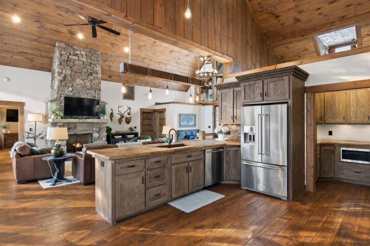 The open-concept layout flows seamlessly, connecting the kitchen, dining, and living areas for effortless gatherings.