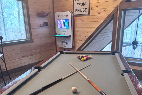 Two games, one table — switch from billiards to table tennis in seconds at our Broken Bow vacation rental