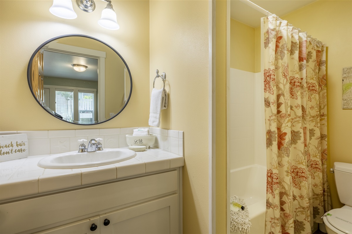 Your own private full bath, the perfect place to rinse off the sand and salt.