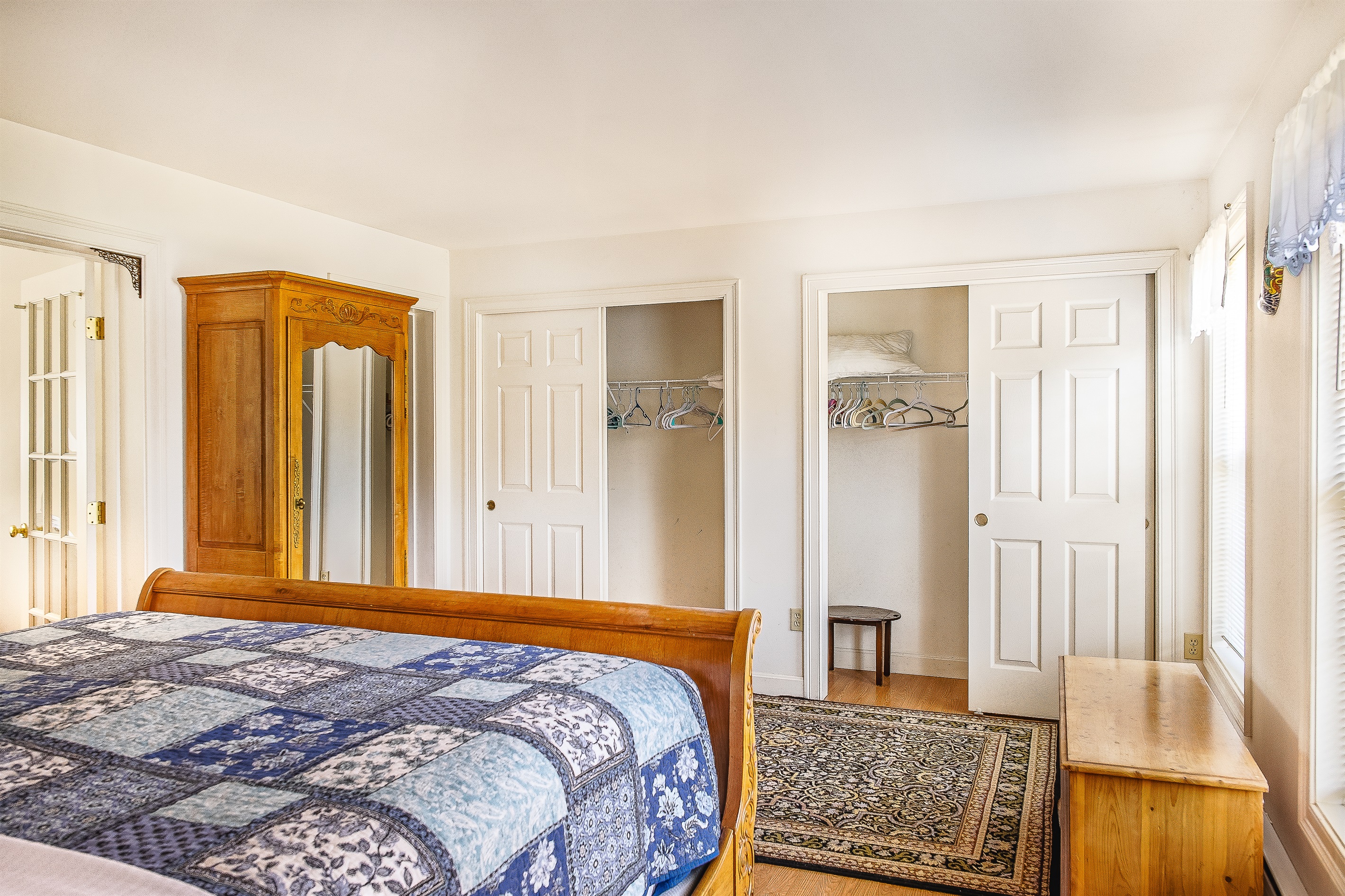 Relax in the spacious primary suite featuring a king bed, double closets, and a private sitting room. Located on the upper level for maximum privacy, this quiet retreat is the perfect place to recharge after a day exploring Acadia National Park.