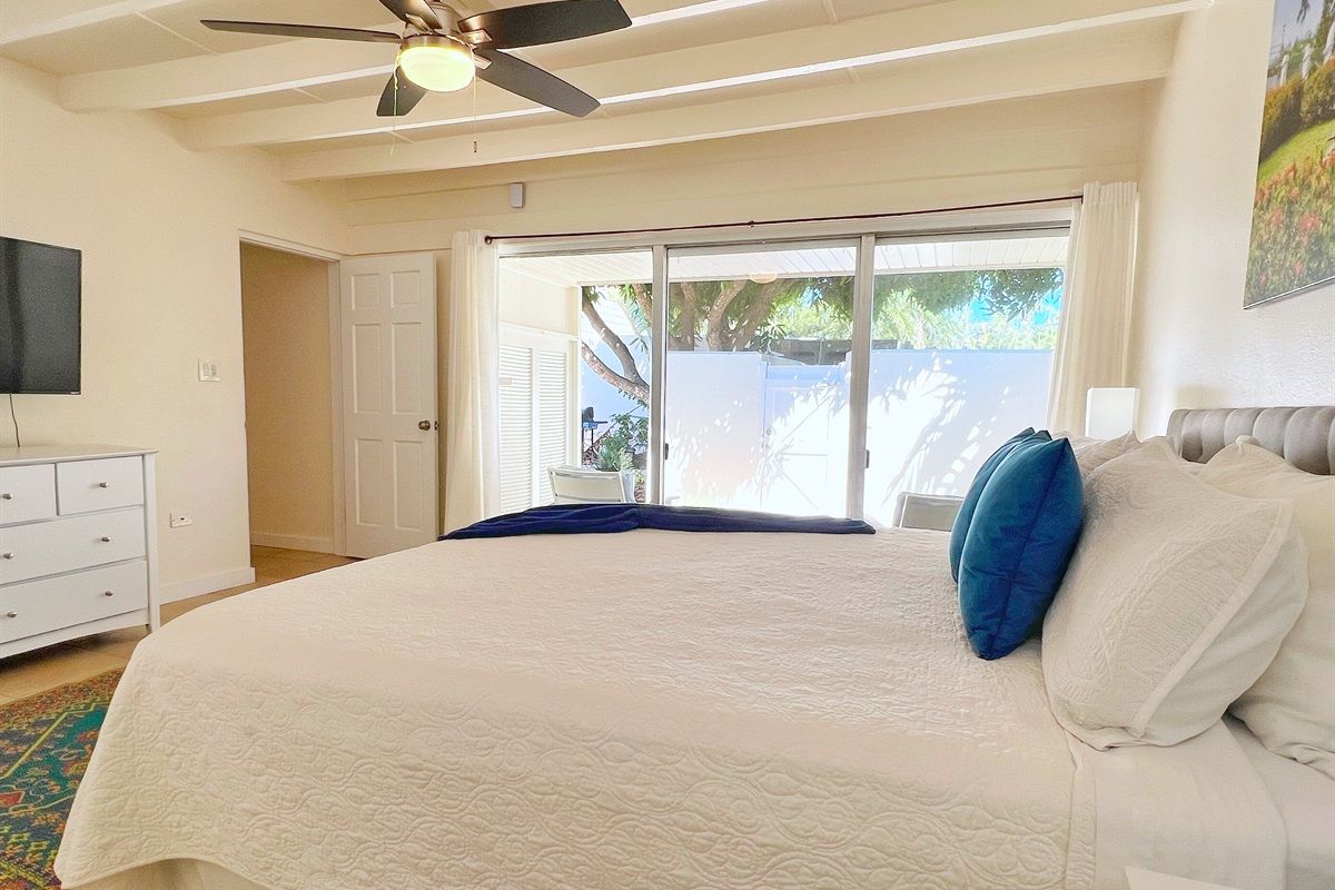 Glass doors open to the outside, bringing in fresh island breezes and warmth.