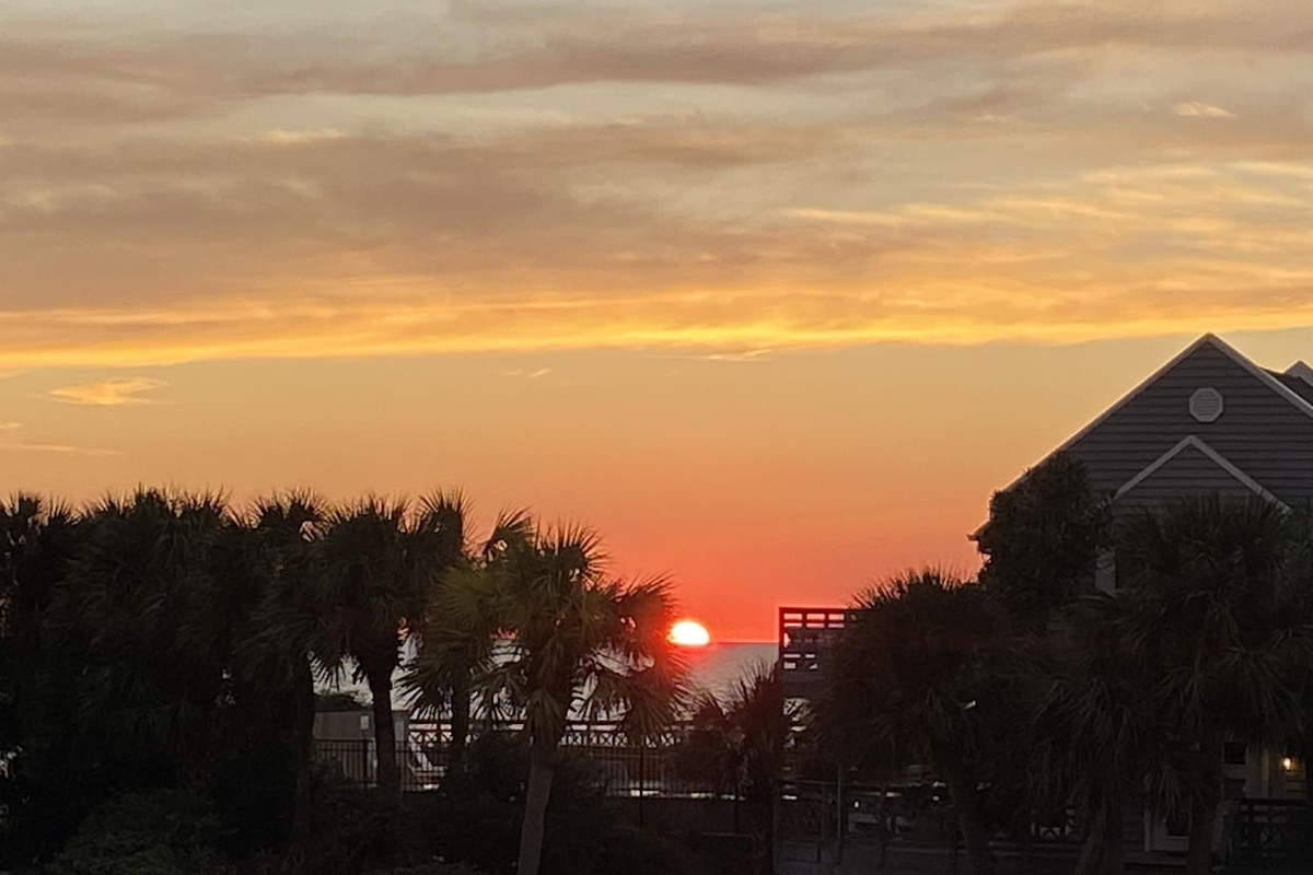 Your deck catches the color of every sunset &mdash; this one came out especially vivid, and they all feel like this.	
