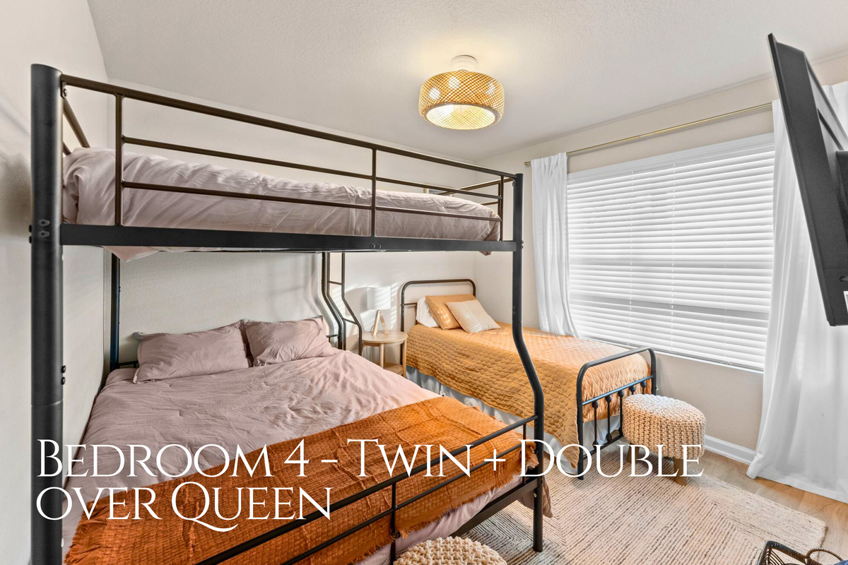 Lastly, the fourth bedrooms features a unique bunk setup with a twin and double over a queen, making it a great option for kids, teens, or groups traveling together.