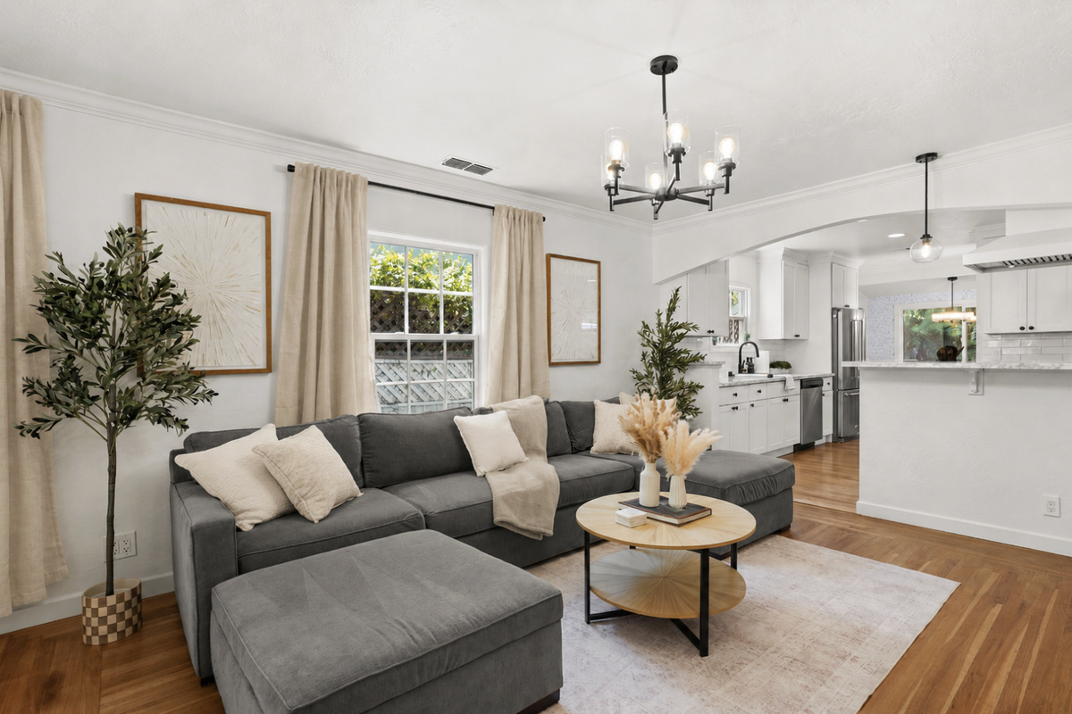 Spacious lounge connecting seamlessly to the kitchen and dining area