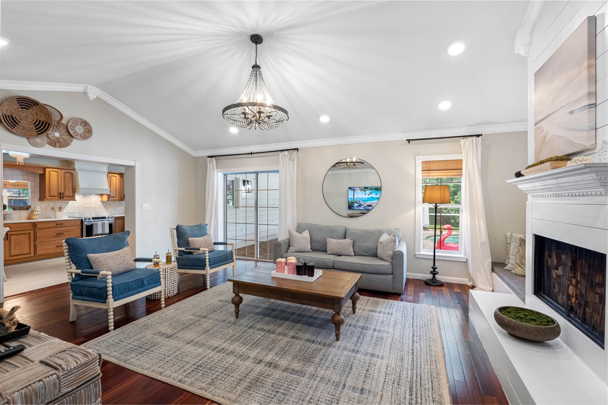 Comfortable seating and a warm color palette make this living room the perfect spot for relaxing with family or friends.